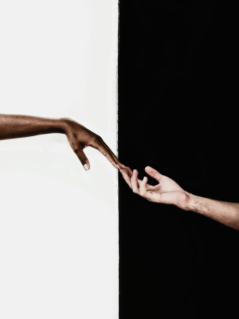 Hands in Front of White and Black Background